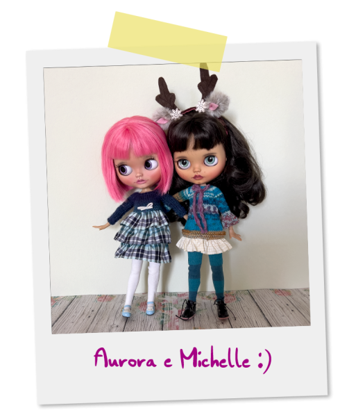A Polaroid photo with Aurora and Michelle custom Blythe doll hugging earch other